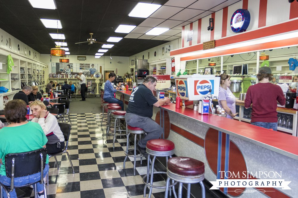 Retro 60’s look inside Mayberry’s namesake, Walker’s Soda Fountain. Notice the retro soda dispensers!!