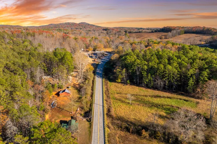 Aerial view of a road leading towards Mount Airy.