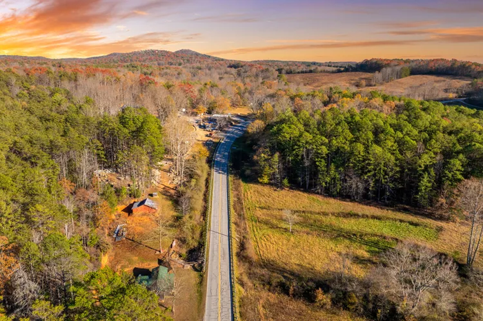 Aerial view of a road leading towards Mount Airy.